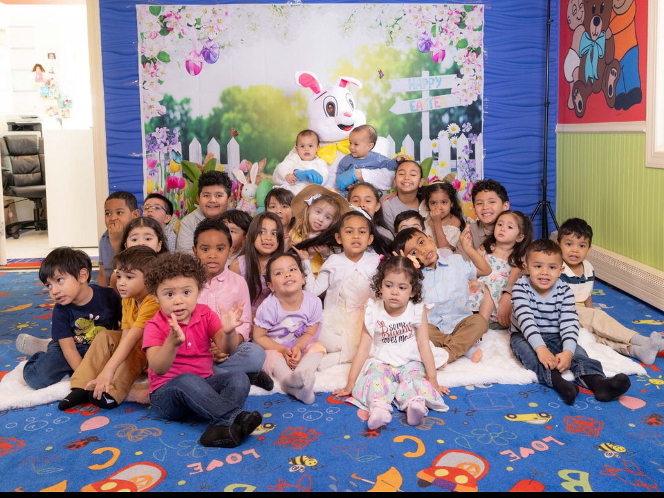 Large group of daycare children with Easter Bunny